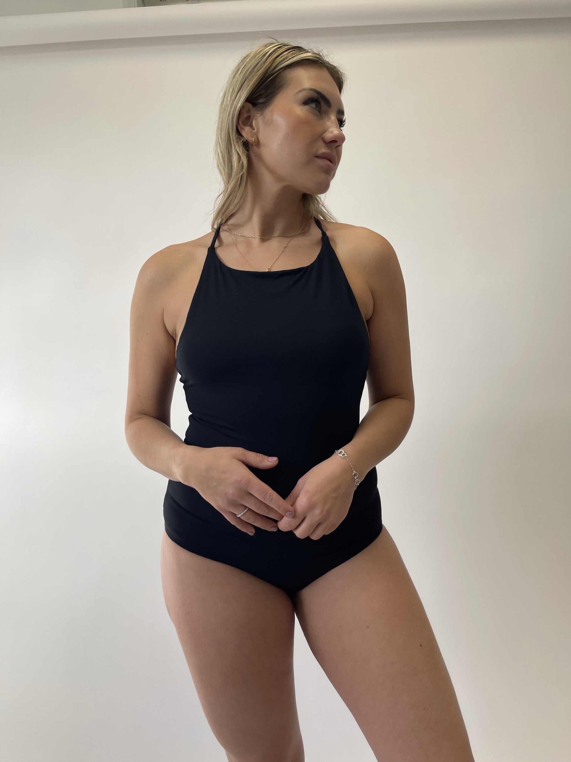sustainable cross back bodysuit in black
